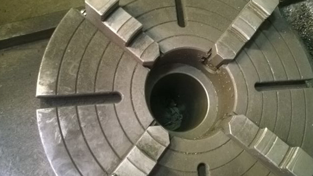 四爪卡盤找正的簡便方法，（四爪卡盤如何找正）